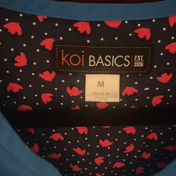 Royal Blue Scrub Set with Floral Lining by Koi - Picture 2 of 5